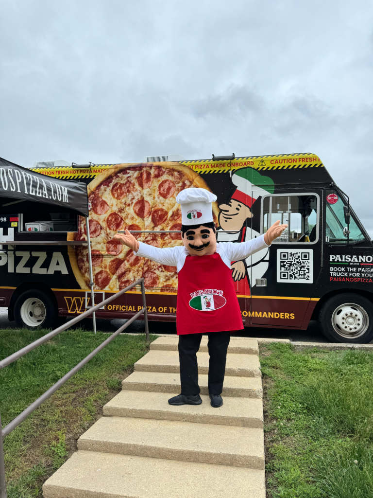 Paisano's food truck serving guests
